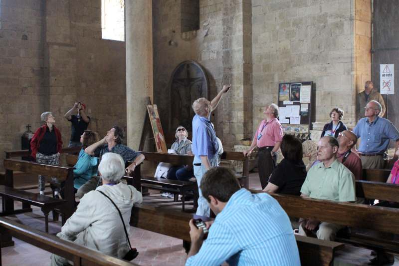 a group of people sitting in a church