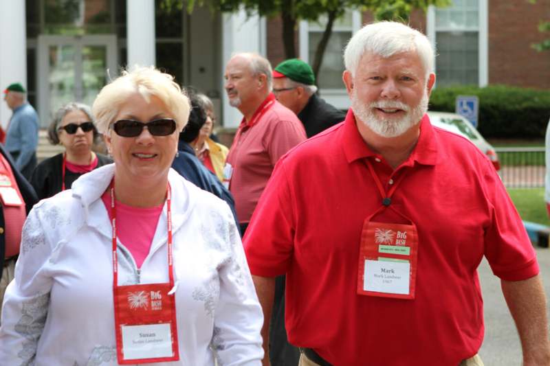 a man and woman wearing name tags