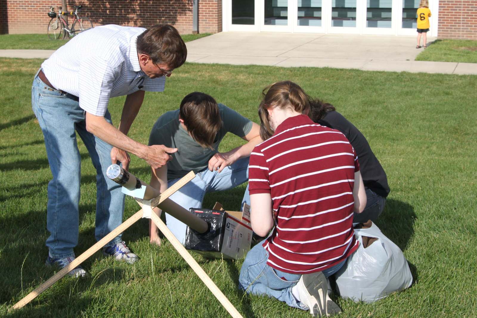 a group of people working on a rocket