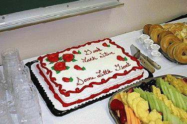 a cake and fruit on a table