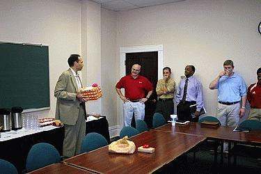 a group of men in a meeting