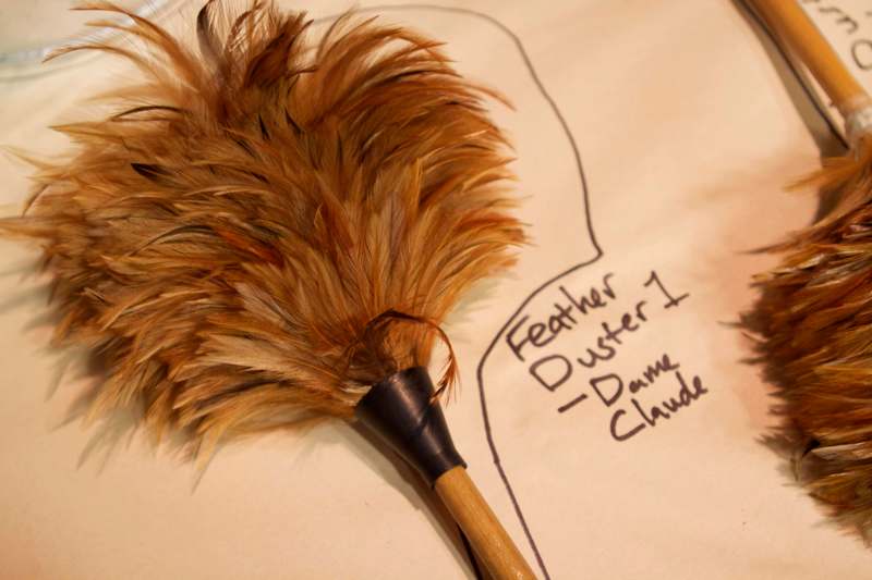 a feather duster on a piece of paper