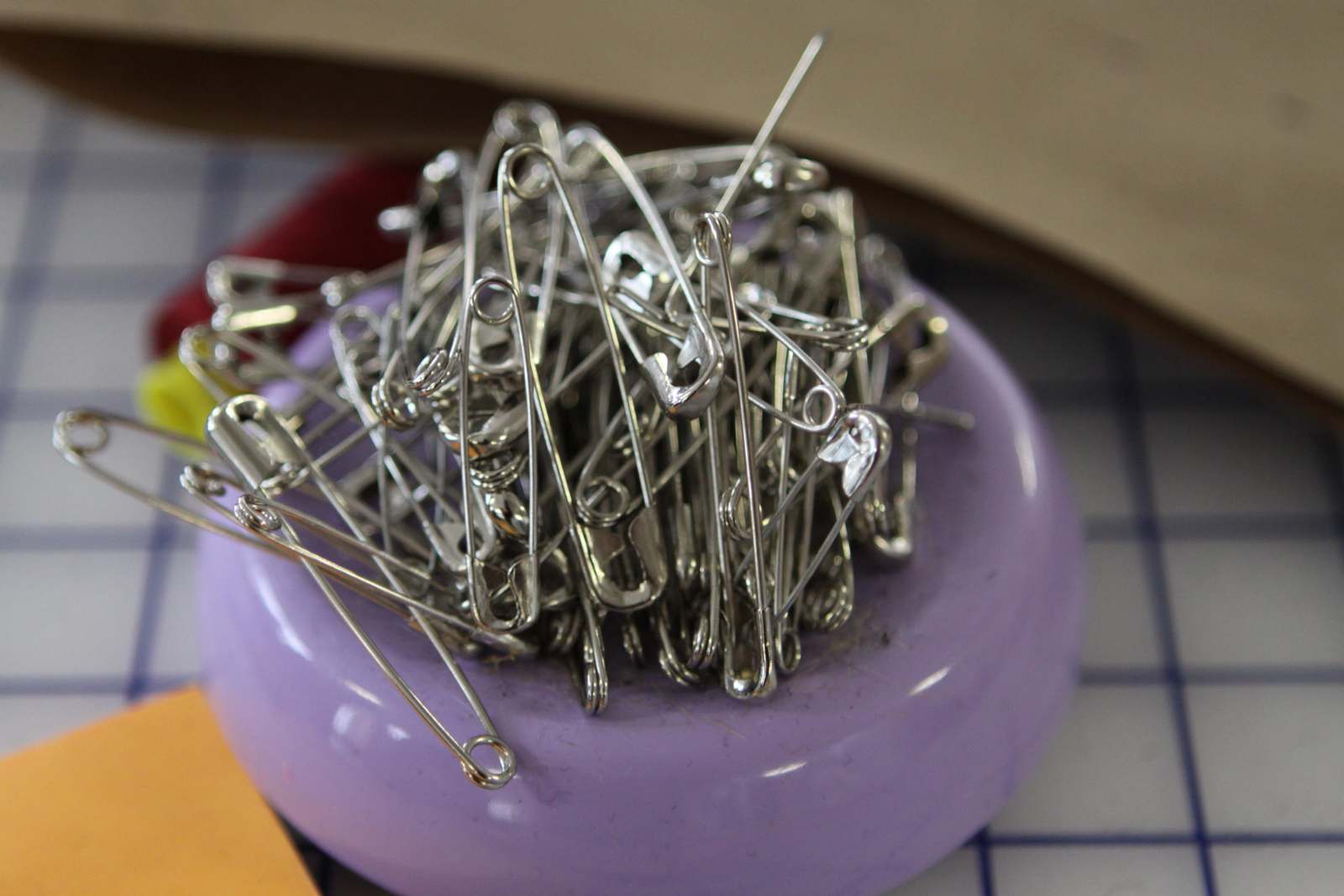 a pile of safety pins