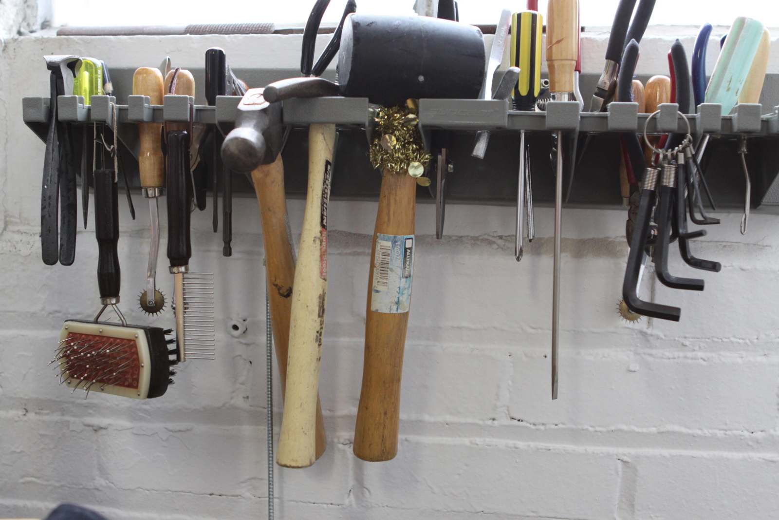 a group of tools on a wall