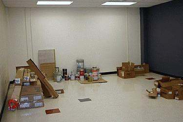 a room with boxes and cans