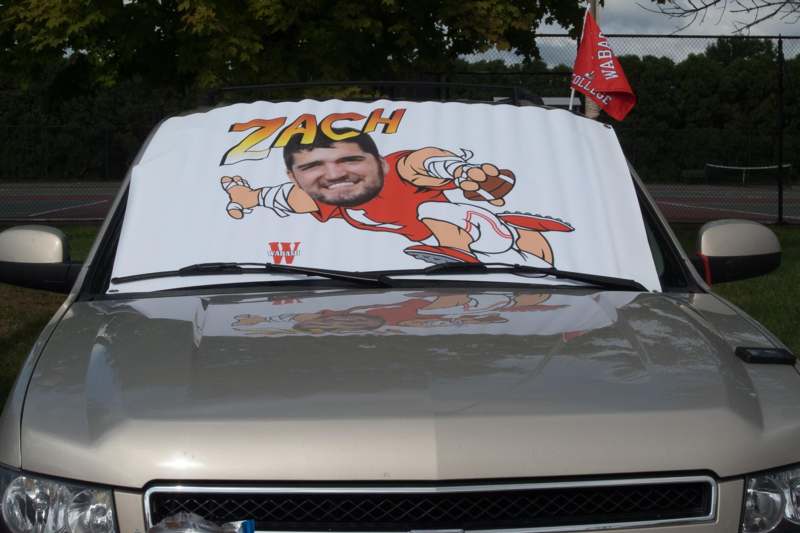 a car with a cartoon on the hood