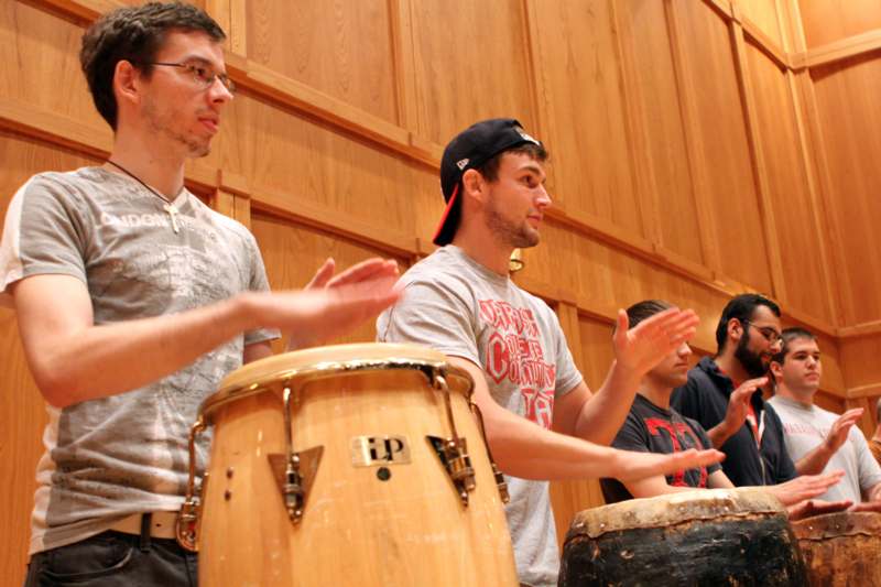 a group of men playing drums
