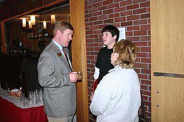 a man talking to a boy