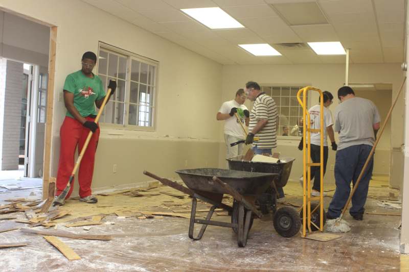 a group of people working in a room