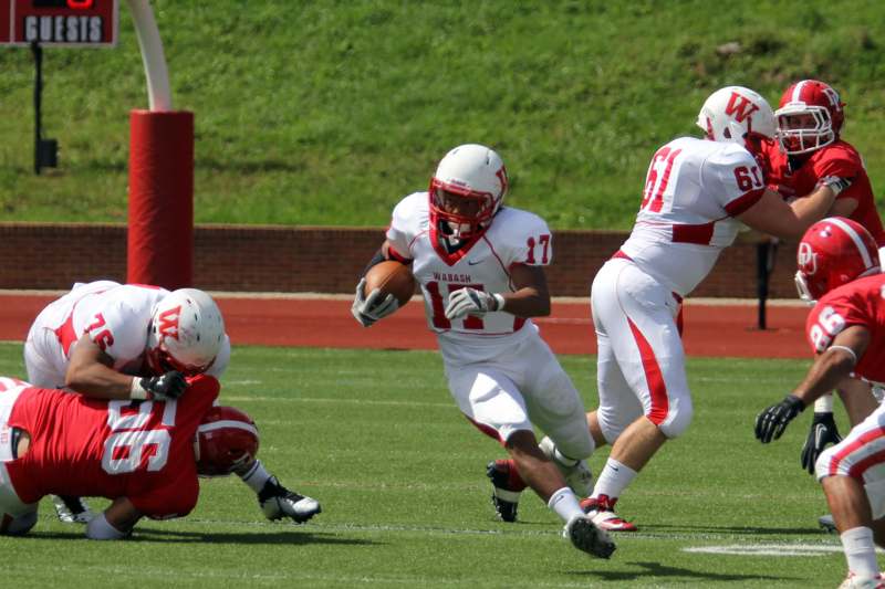 a football player running with the ball