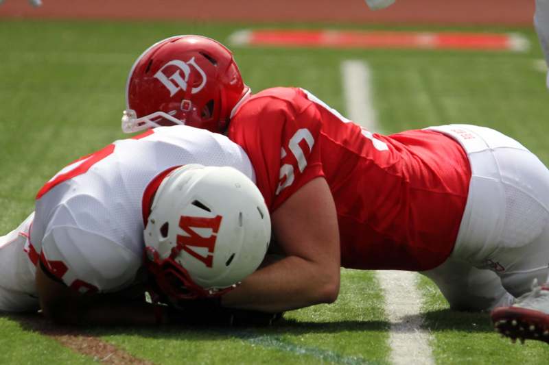 two football players on the ground