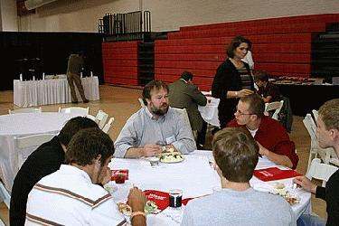 a group of people sitting at a table