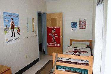 a bedroom with a door and a bed
