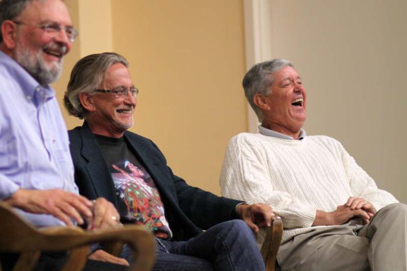 a group of men laughing