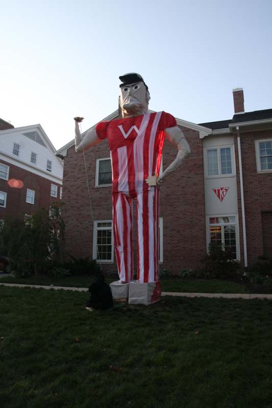 a large inflatable man in a yard
