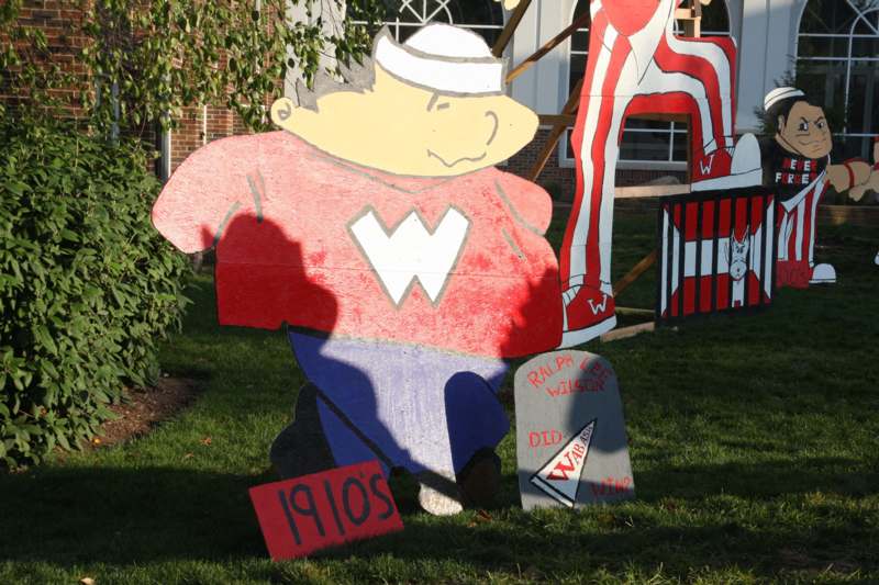 a cut out of a man in a red shirt