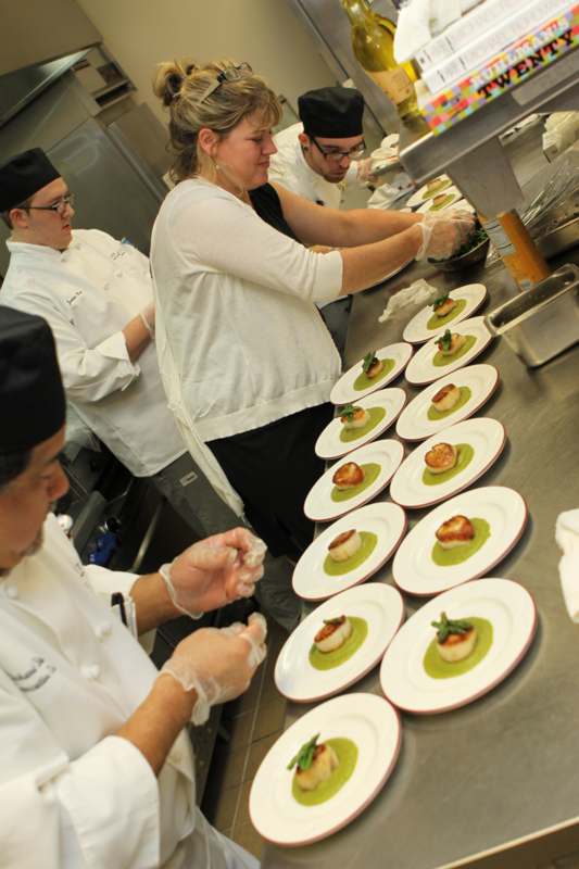 a group of chefs preparing food
