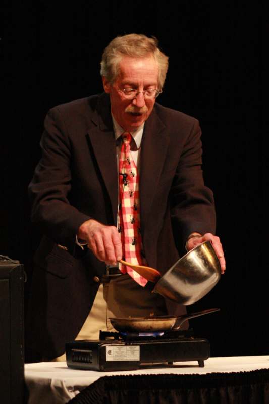 a man cooking on a stove
