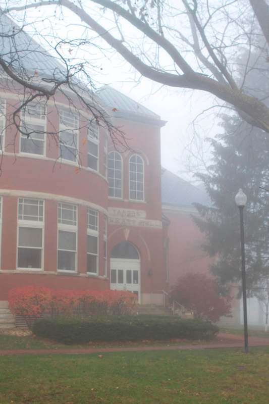 a building with a foggy background