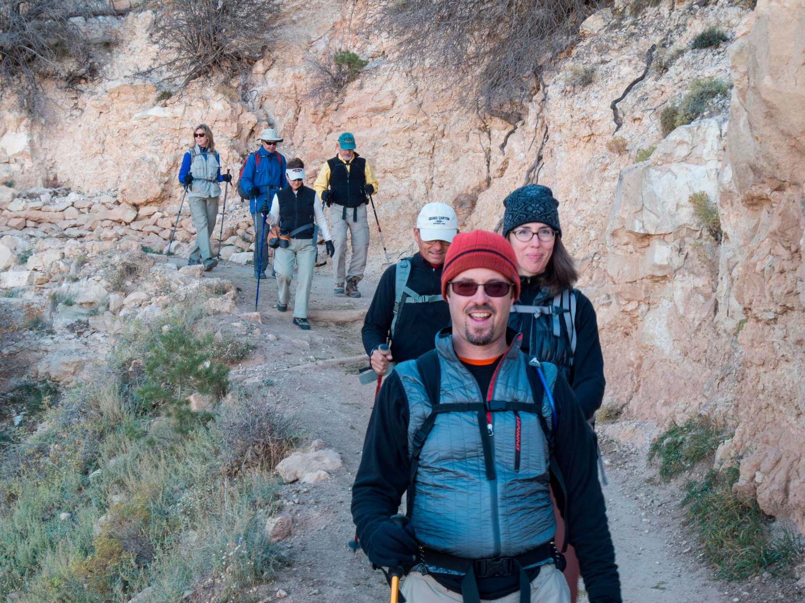 a group of people hiking on a trail