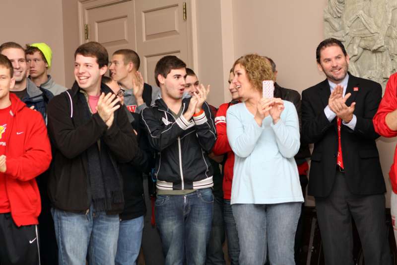 a group of people clapping and clapping hands
