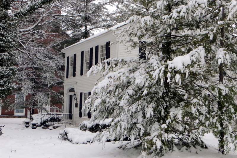 a house with snow on the ground
