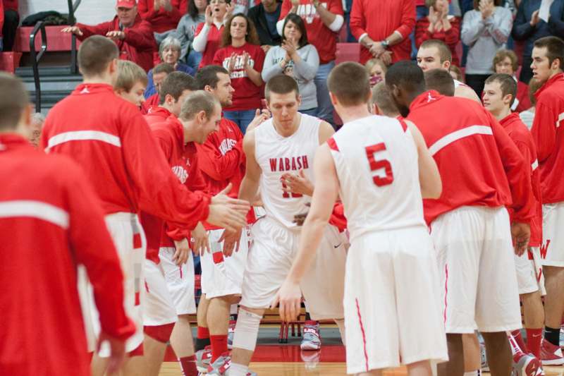 a group of men in a basketball game