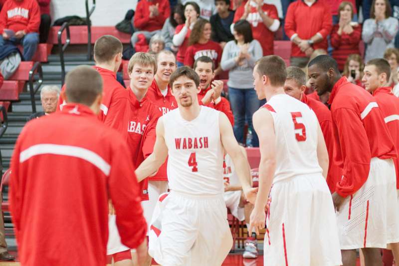 a group of men in a basketball game