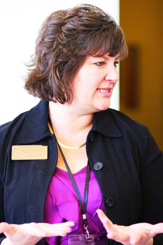 a woman wearing a name tag