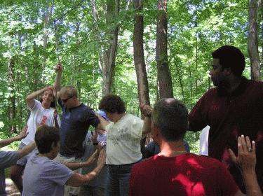 a group of people standing in a circle