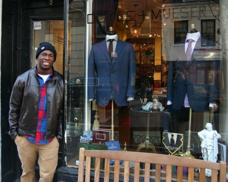 a man standing in front of a store