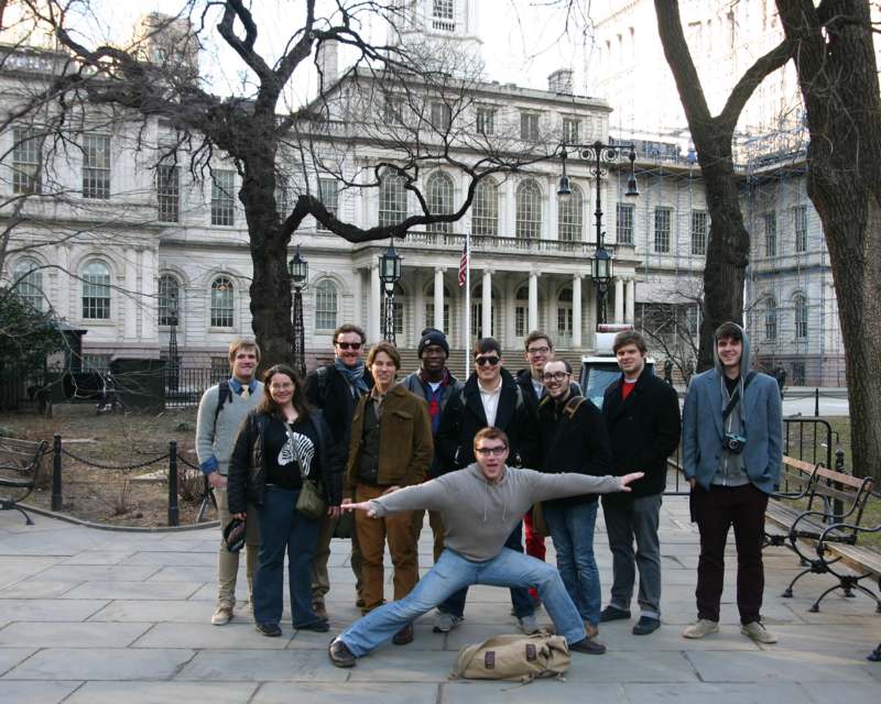 a group of people posing for a photo