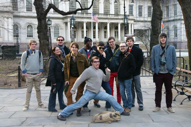 a group of people posing for a photo