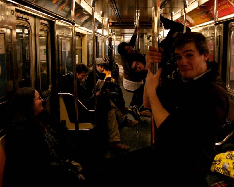 a group of people on a subway car