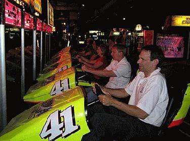 a group of people playing a race car