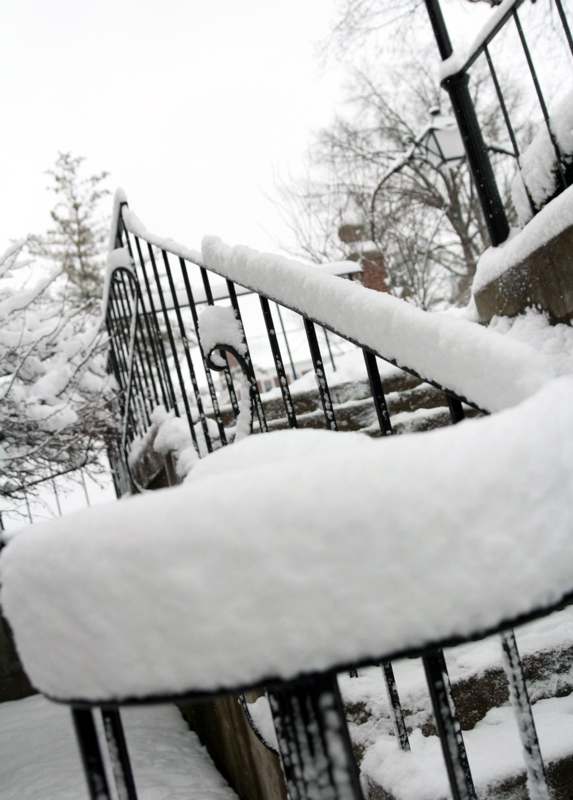 a snow covered stairs and stairs