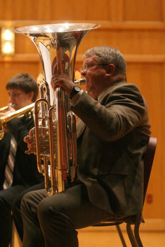 a man playing a horn