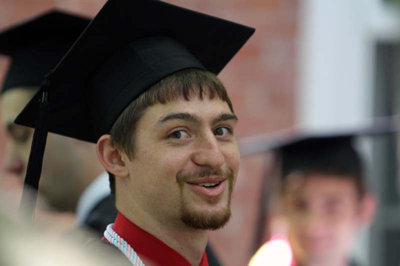 a man in a graduation cap