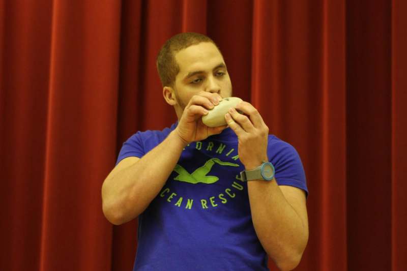 a man eating a doughnut