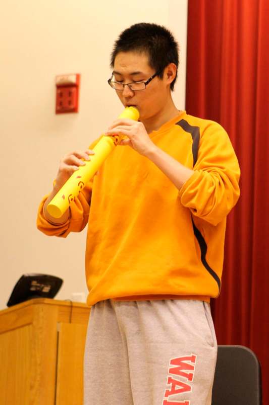 a man playing a flute