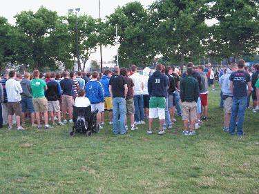 a group of people standing in a line