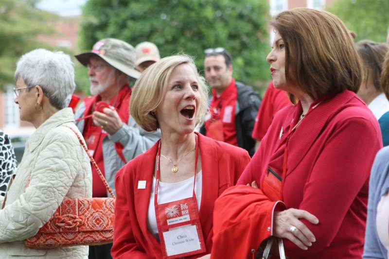 a group of women wearing red shirts