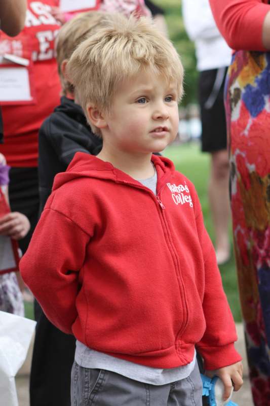 a child in a red jacket