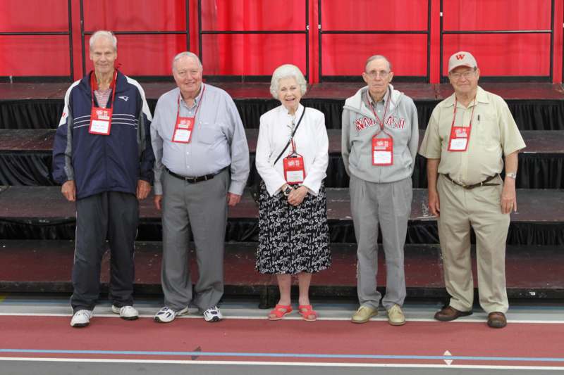 a group of old people standing together