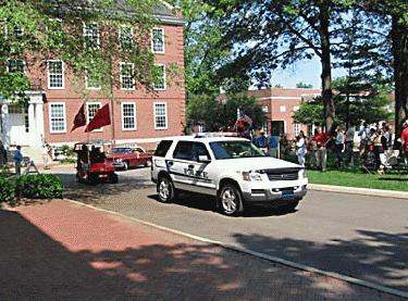 a police car driving down the street