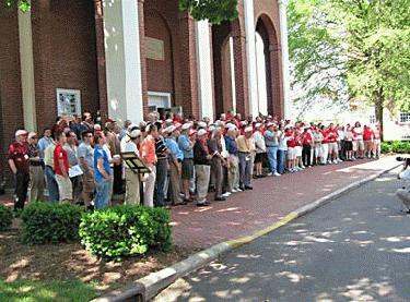 a group of people standing in a line