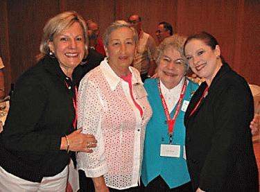 a group of women posing for a photo