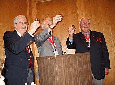 a group of men at a podium