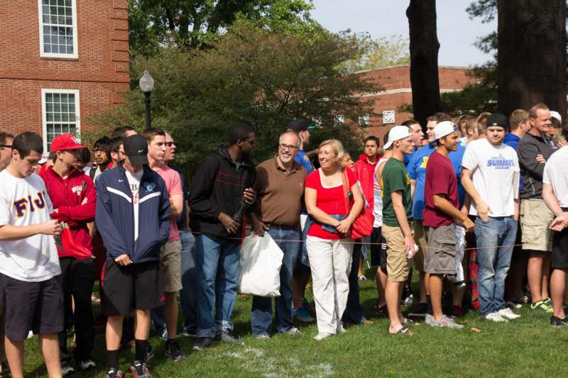 a group of people standing in a line