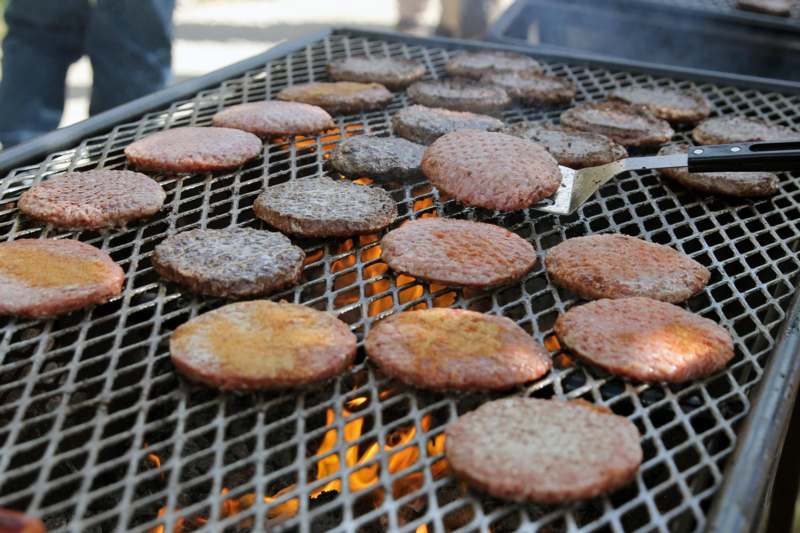 hamburger burgers cooking on a grill